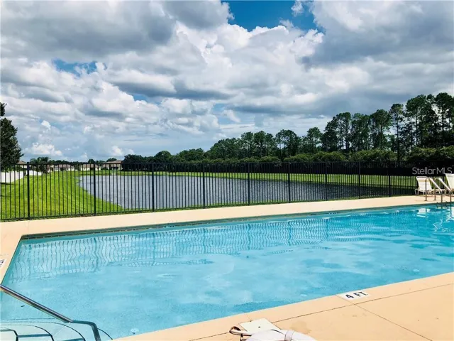 Yes very nice pool with view of the retention pond