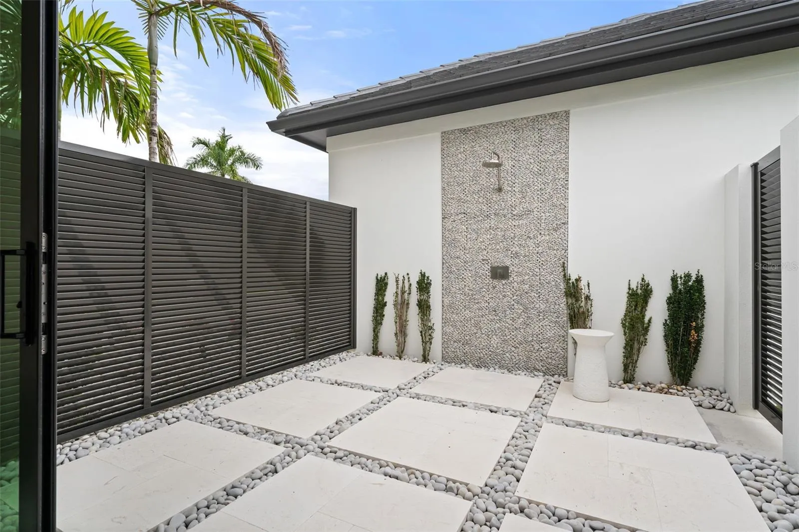 The patio is big enough for a cold plunge or sauna!