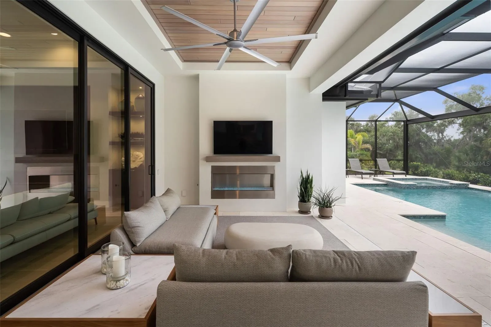 The outdoor TV is included.