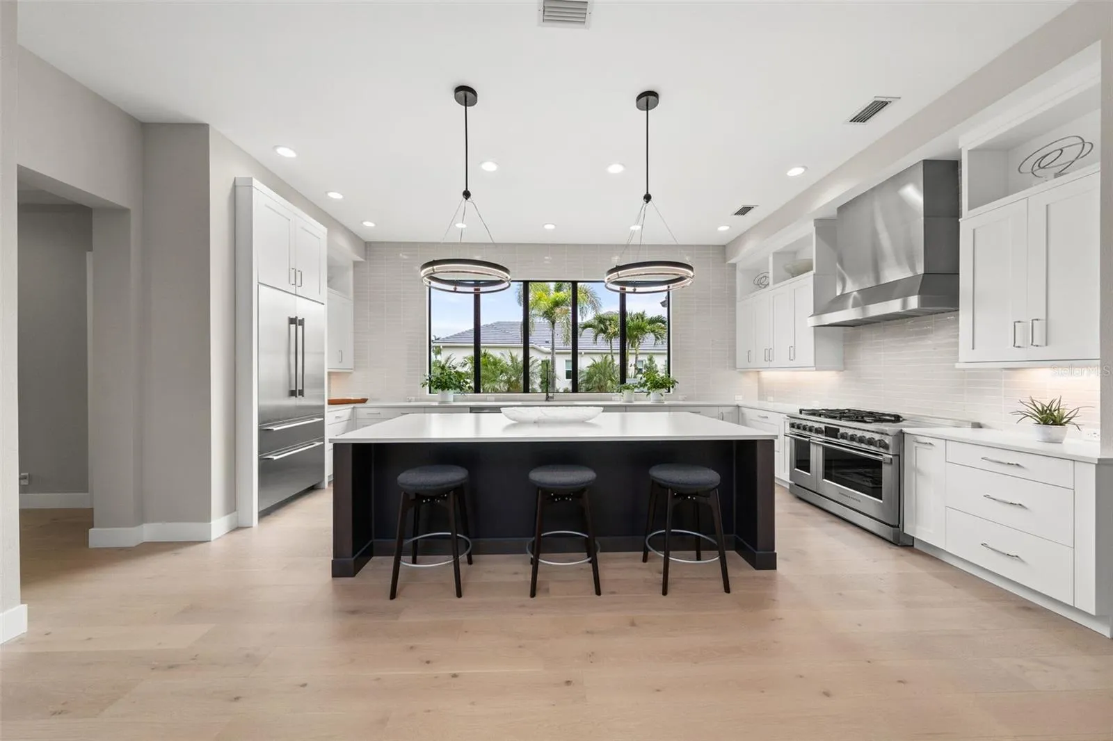 The heart of the home is the chef’s kitchen, thoughtfully designed for entertaining and everyday enjoyment.
