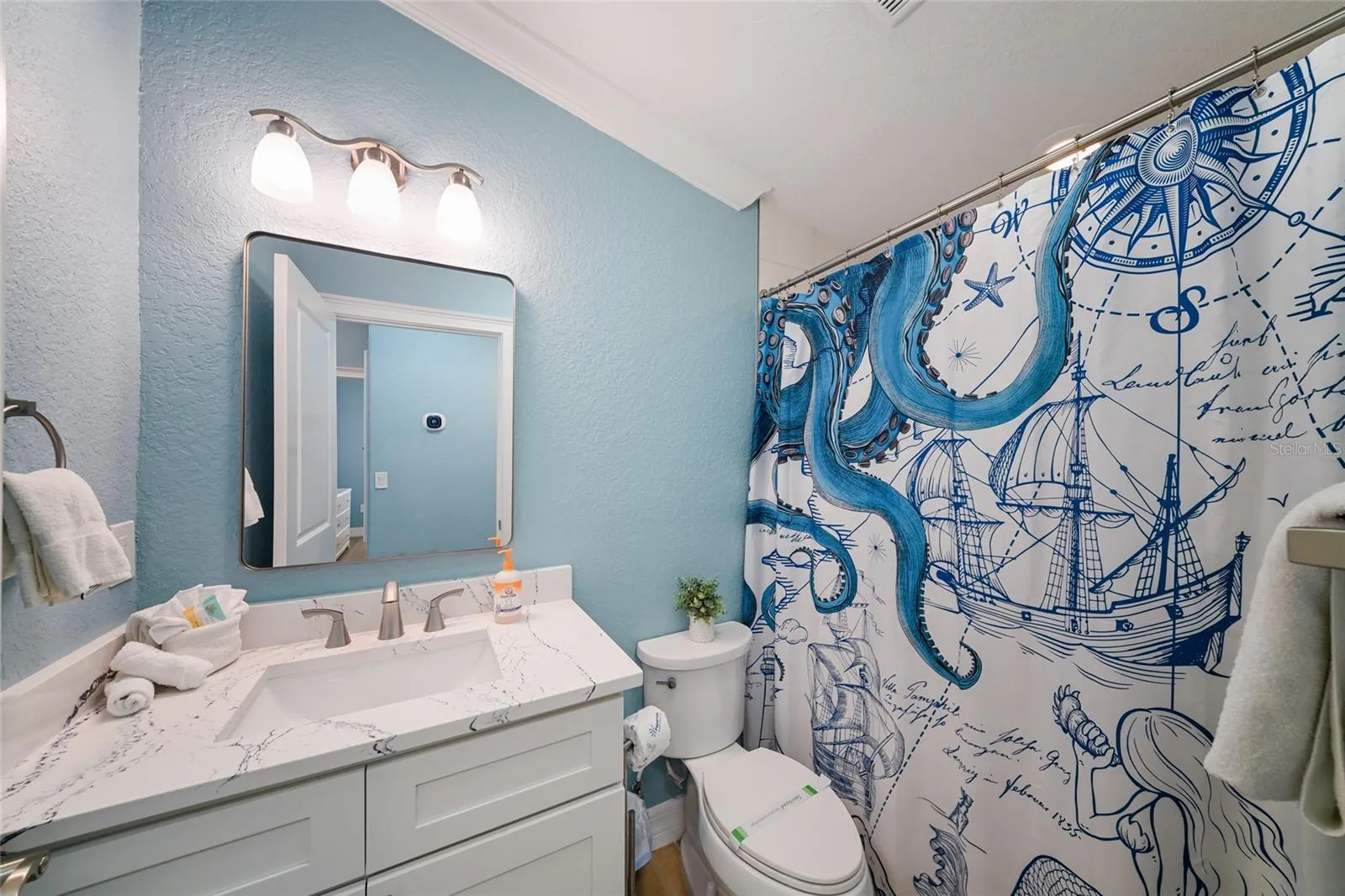 Newly remodeled bathroom #2 with a tub/shower combo