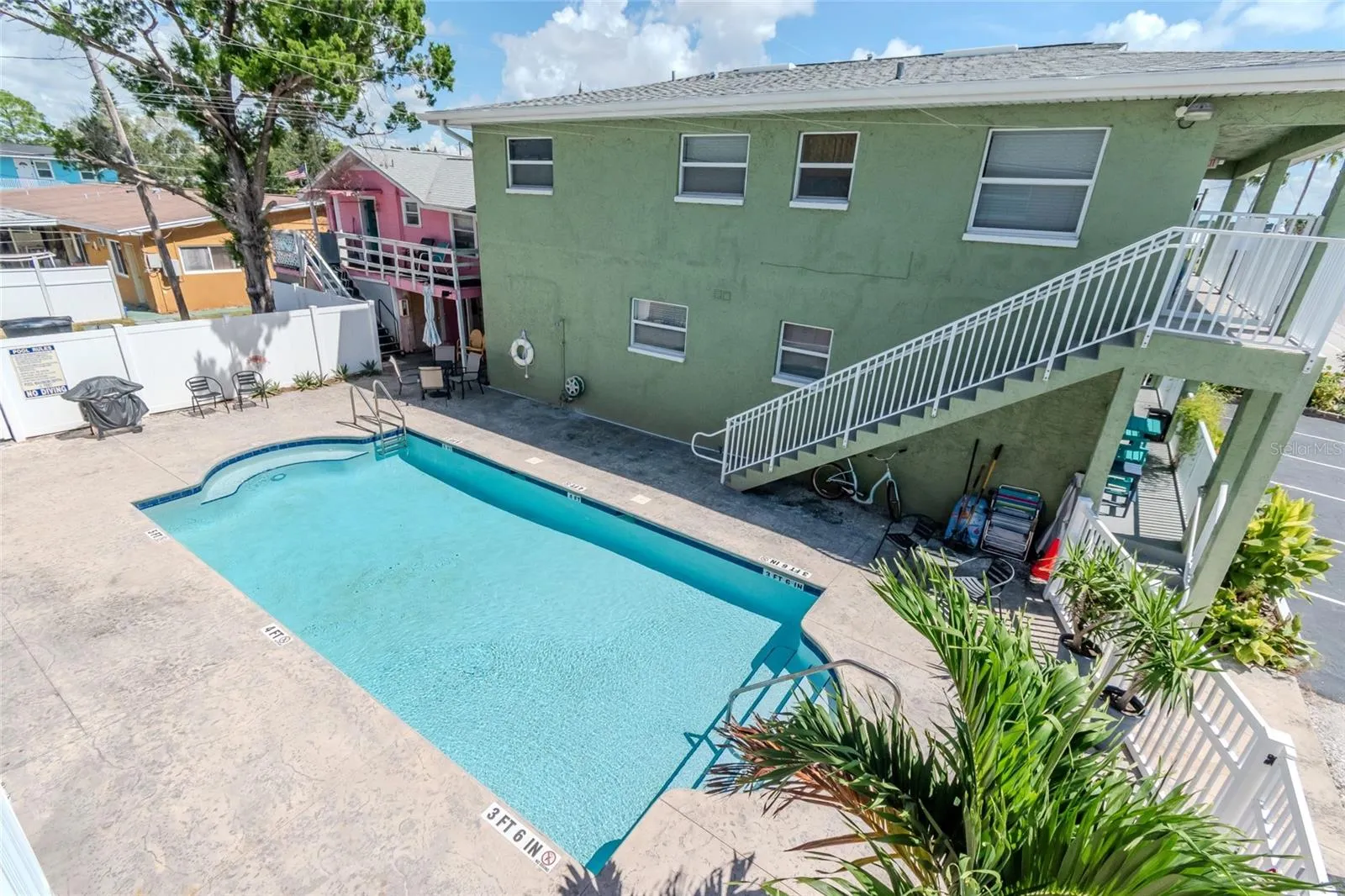 SECURE ENTRANCE TO POOL AREA OFF FROM THE BALCONY
