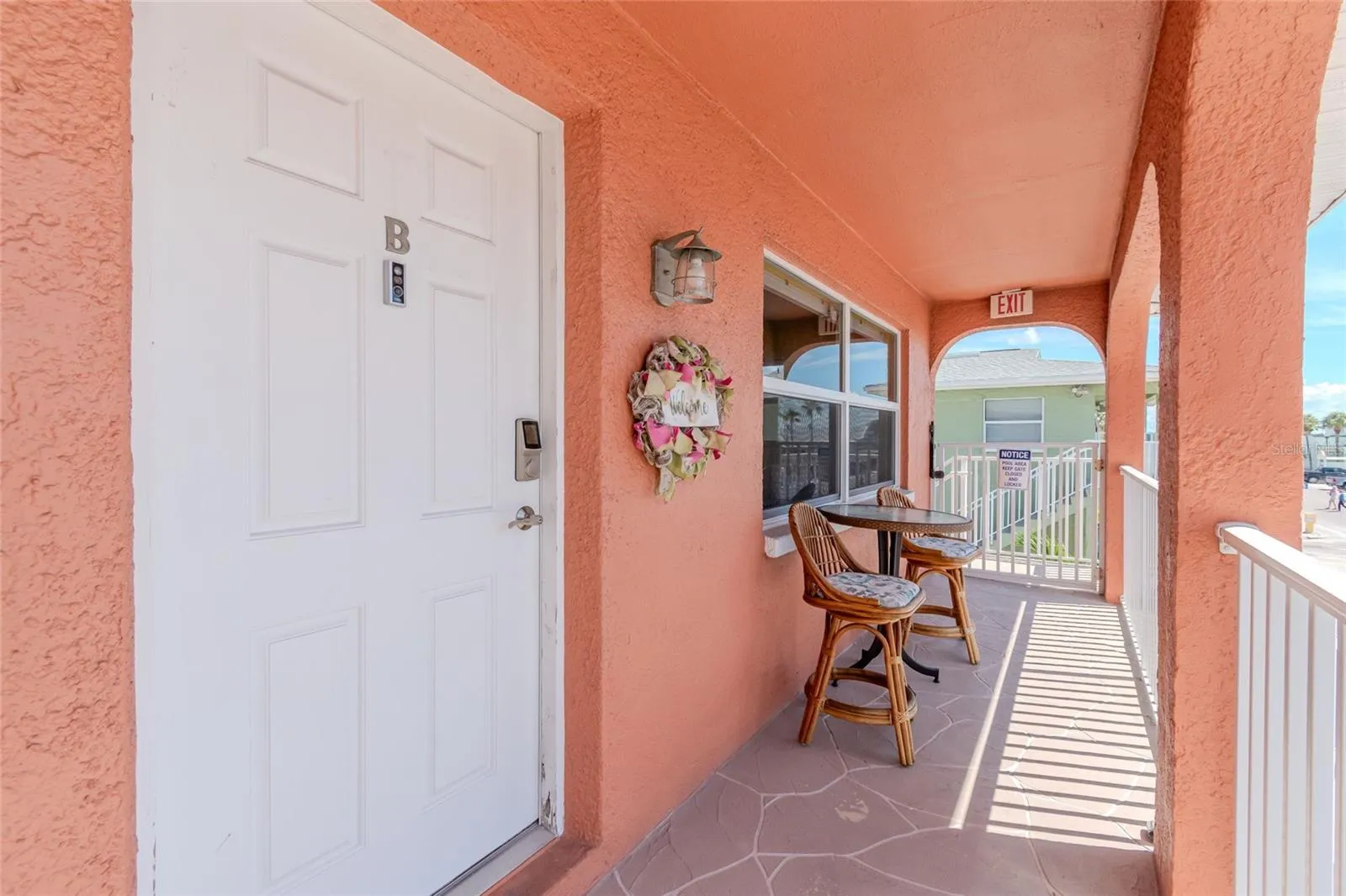 FRONT BALCONY/DOOR TO UNIT 1B
