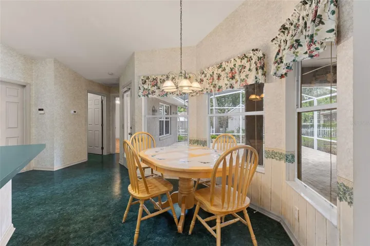Eat in kitchen with view to the screened patio