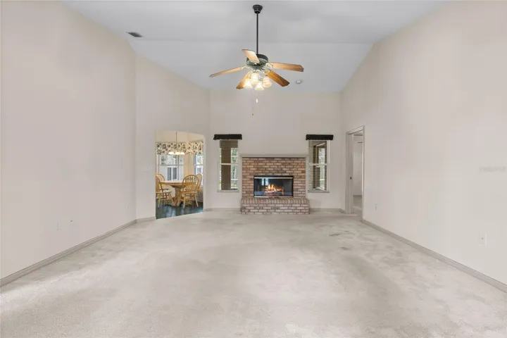 Split floor plan with bedrooms to the right, kitchen to the left