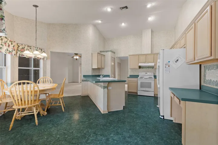 Kitchen is in the center of the home