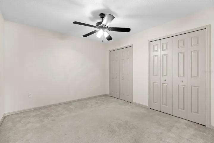 Bedroom 2 with closet full length of wall