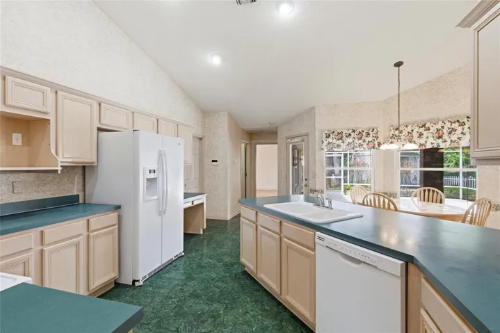 Kitchen with view to primary suite