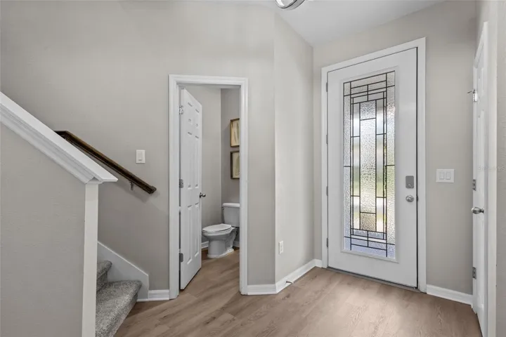 Welcoming foyer includes a convenient coat closet for everyday storage