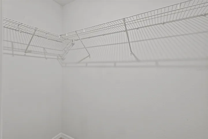 One upstairs bedroom includes a walk-in closet for additional storage