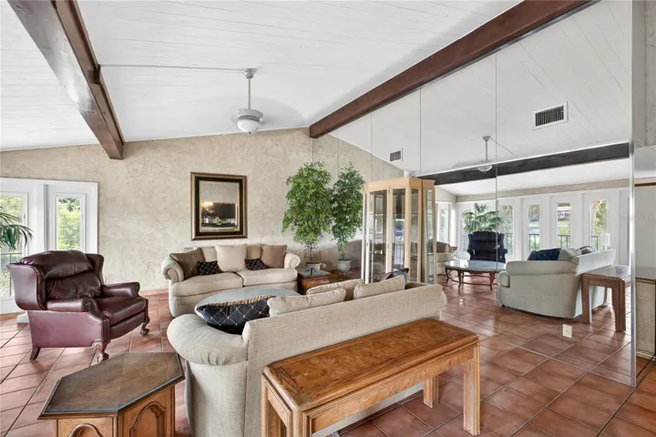 Living room with vaulted ceiling.