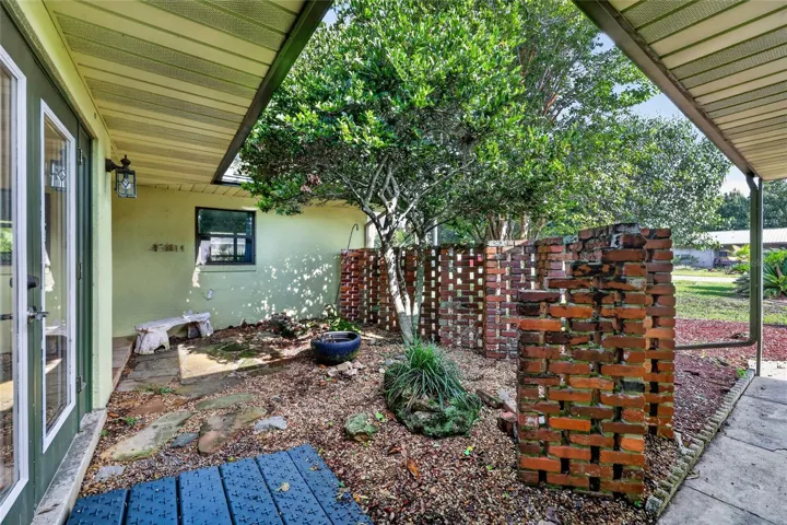 Front Zen Garden with Brick Wall