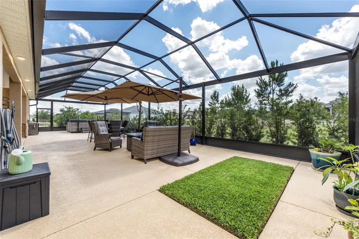 Expansive 20x60 ft screened enclosure, perfect for outdoor living.