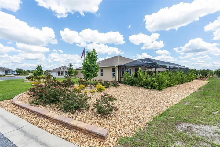 Screened Outdoor Retreat with Raised Xeriscape Beds