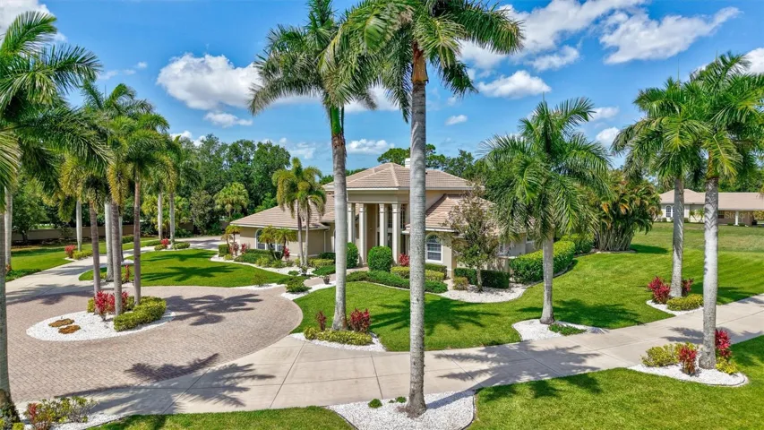 Privately situated on 5.1 acres, this custom-built estate offers 4 bedrooms, 4 full baths, 2 half baths, 6,721 square feet of living space.