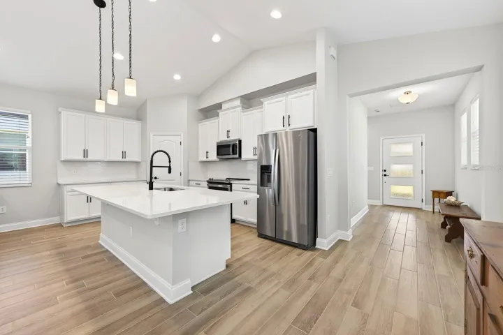 Designed for both everyday living and entertaining, the OPEN CONCEPT living and dining areas connect seamlessly to a spacious kitchen that will impress any home chef.