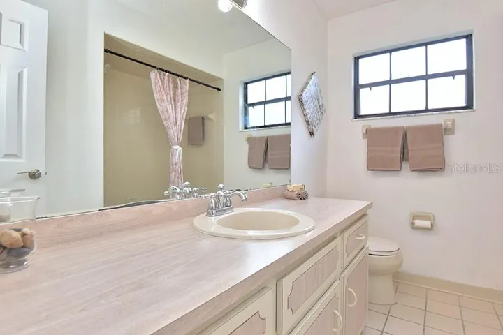 Guest bathroom is a full bathroom with a shower/tub combo