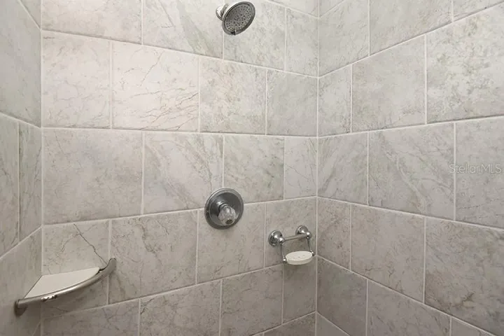 Beautiful tile in primary walk-in shower
