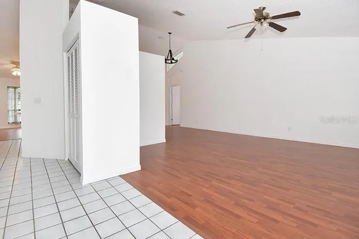 Inside the front door is the living room on your right