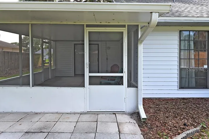 Screened porch backyard access