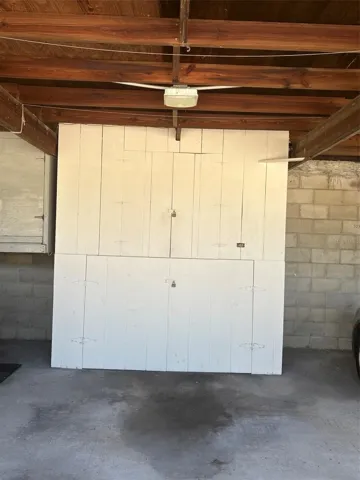 Large storage units in carport - can hold bikes