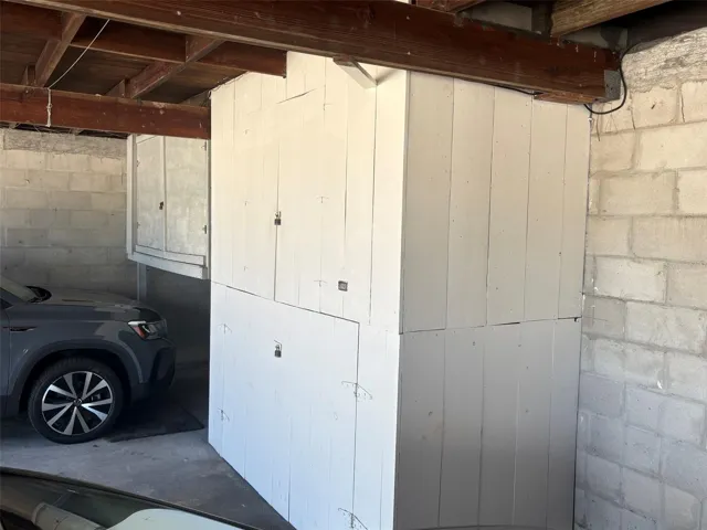 Large storage units in carport - can hold bikes