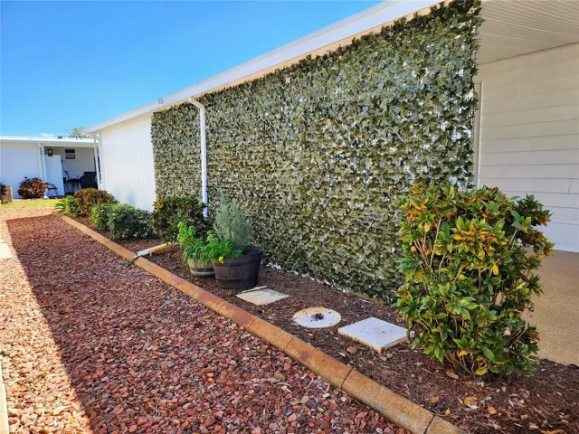 privacy for carport and nice landscaping along the side