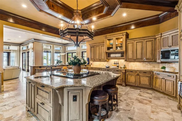 Kitchen with a grand island perfect for hosting & entertaining!