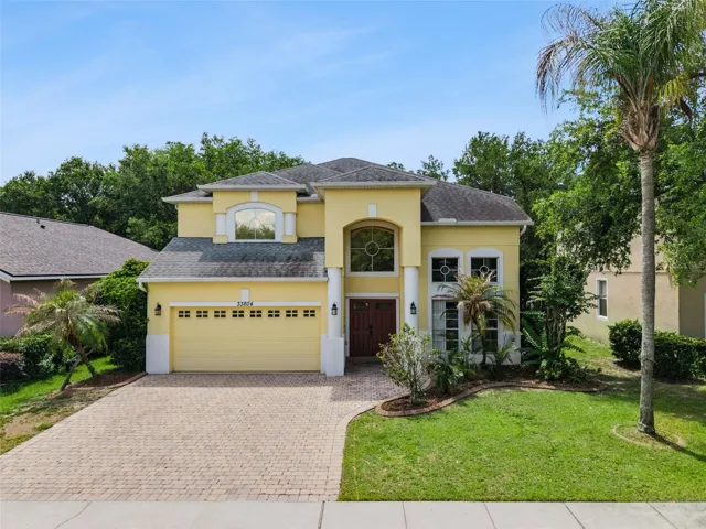Vaulted ceilings and an open layout create a bright, spacious feel throughout the home.