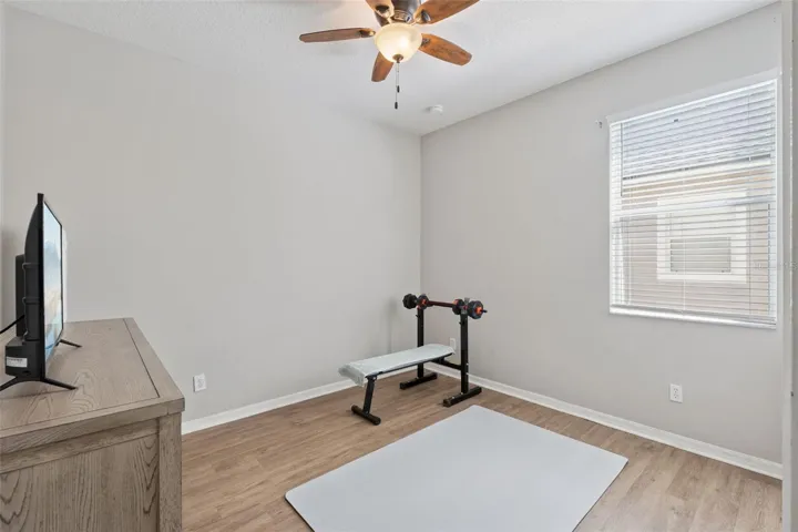 Convenient downstairs bedroom and bath setup ideal for guests or multi-generational living.