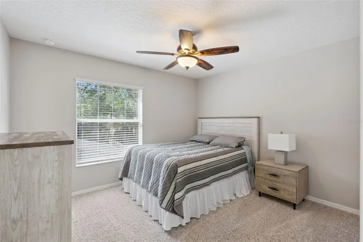 Generously sized secondary bedrooms offer flexibility for family, guests, or office space.