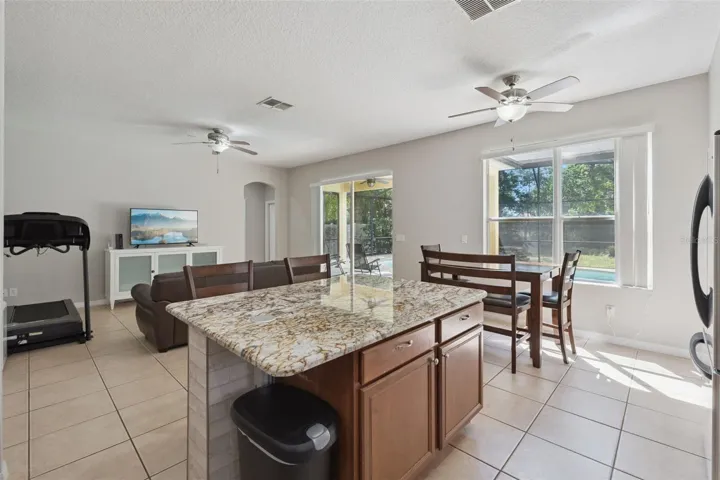 Open-concept living keeps everyone connected from the kitchen to the main living spaces.