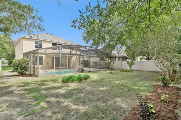 A backyard setup that balances privacy, outdoor living, and usable space.