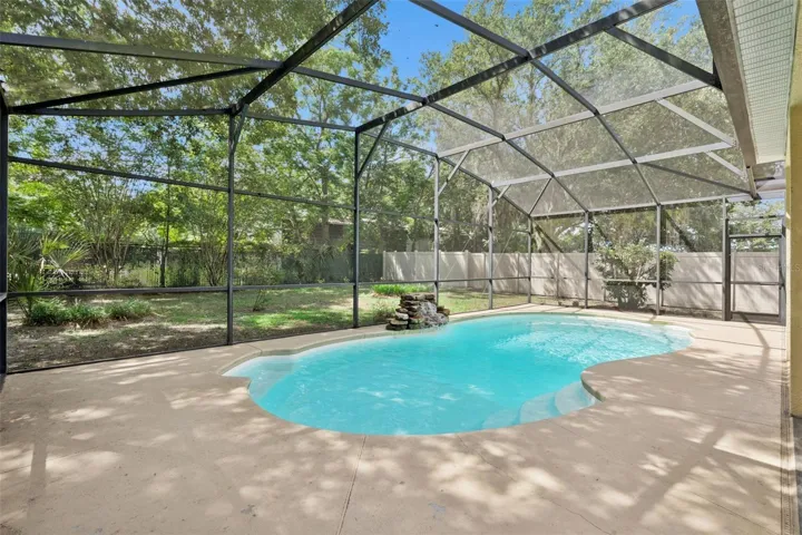 Fenced backyard with no rear neighbors provides added privacy rarely found in newer communities.