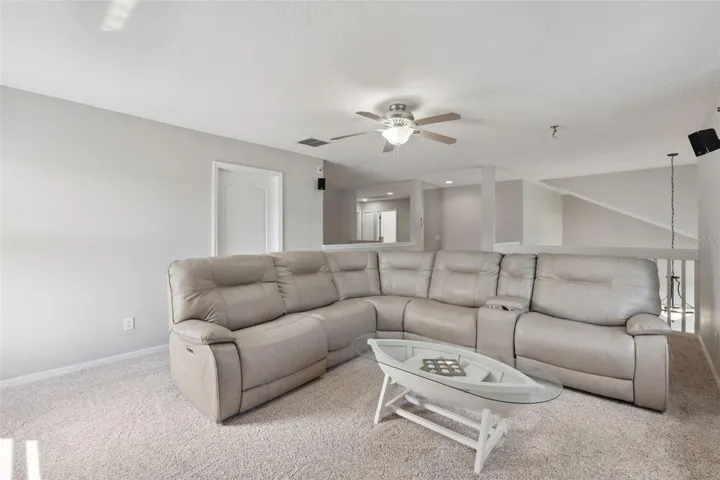 The vaulted design adds openness and architectural character throughout the home.