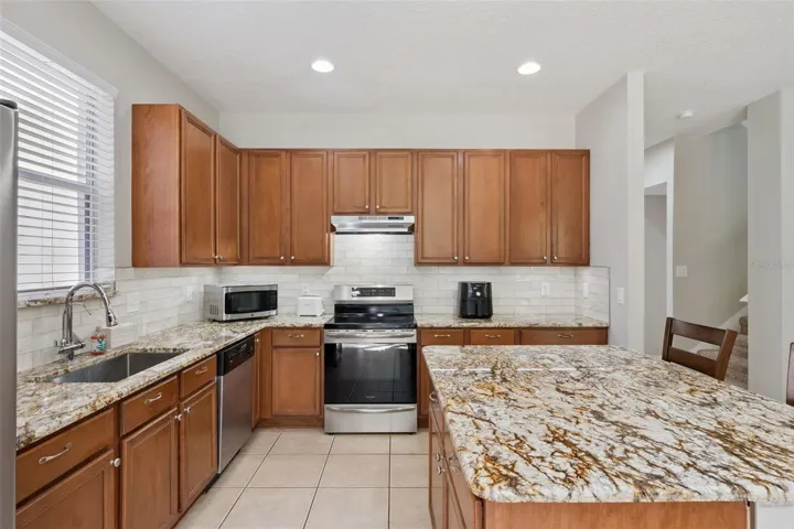 The oversized island was designed for gathering, entertaining, and everyday living.