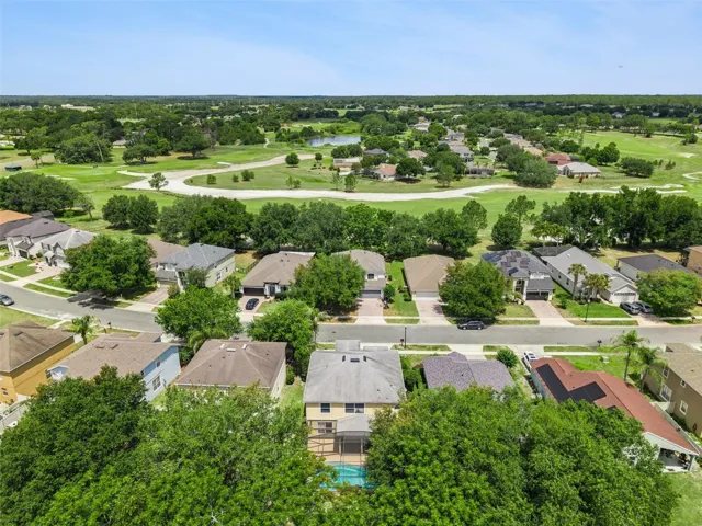 Enjoy scenic golf course surroundings nearby without golf balls in your backyard.