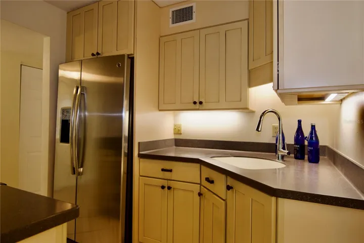 Kitchen with solid wood cabinets.