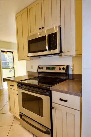 Kitchen with solid wood cabinets.