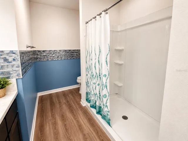 Primary bathroom with stand up shower