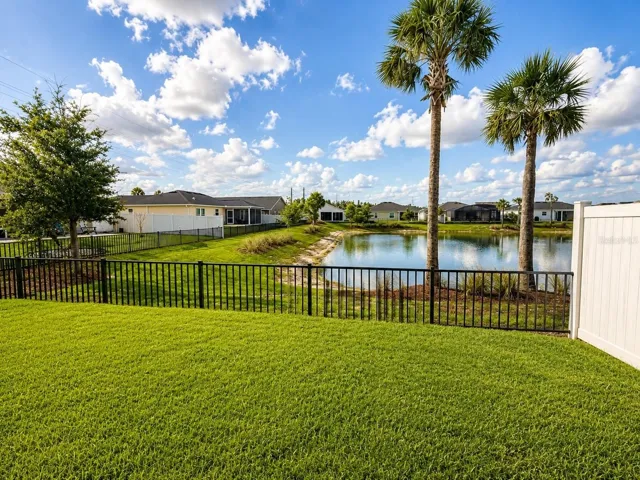 Backyard, fenced and beautiful pond view