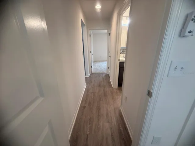 Hallway to guest bedrooms and bathroom