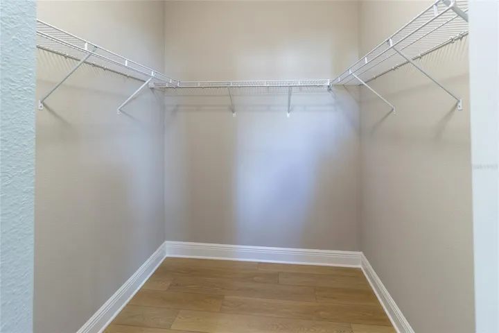 Primary has large walk in closet + linen closet