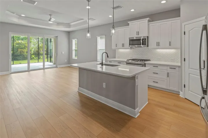 Open concept with upgraded kitchen w/quartz counters, RO System