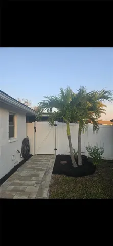Walkway and Fenced Backyard