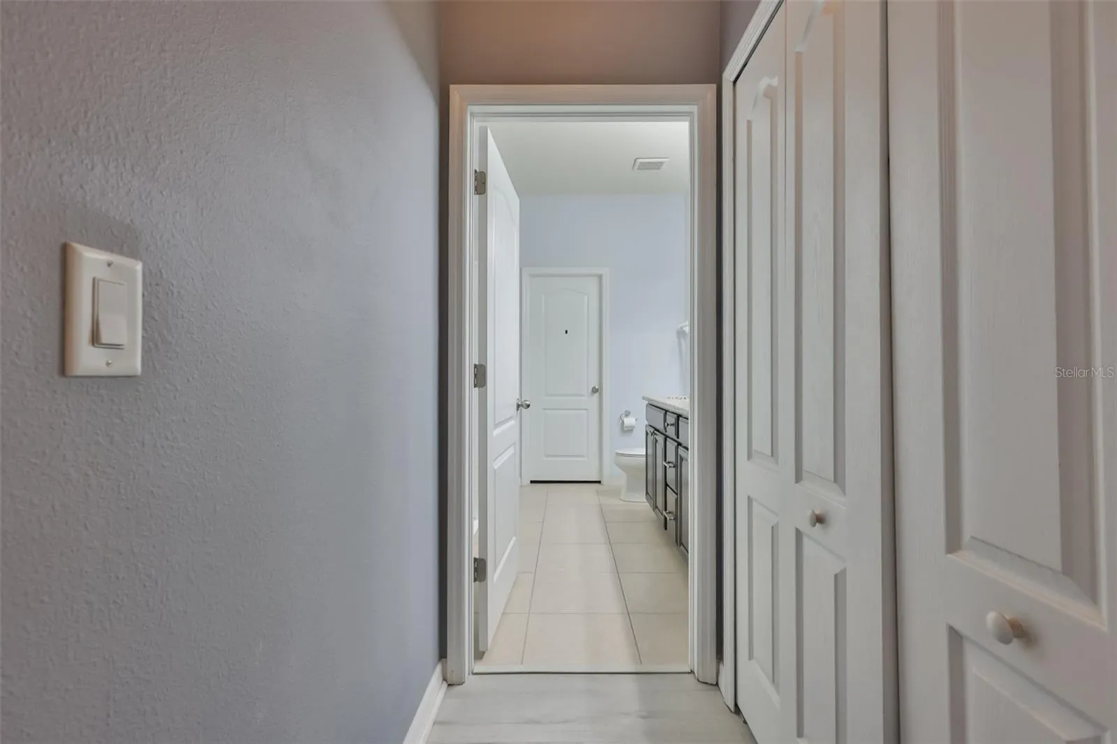 Primary bedroom - built in closet on right