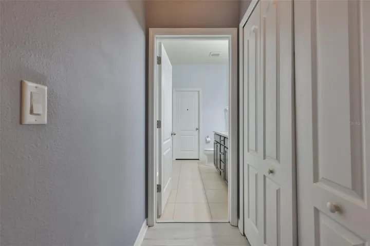 Primary bedroom - built in closet on right