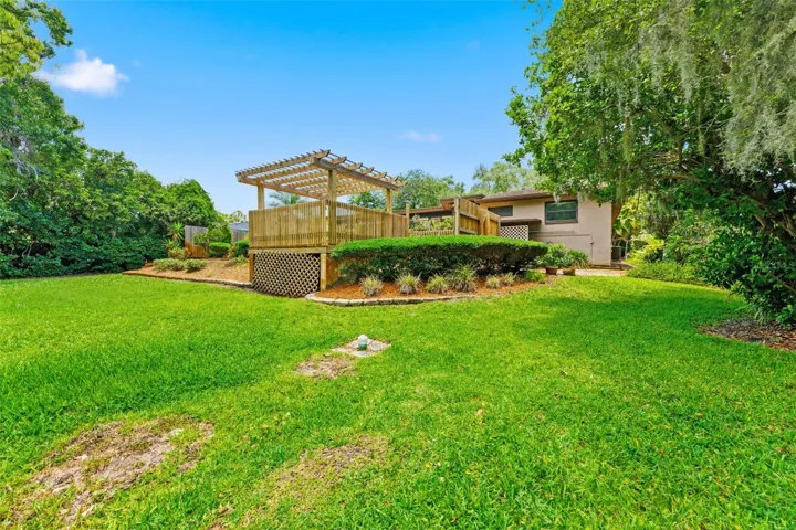 Surrounded by Oaktrees and landscaping
