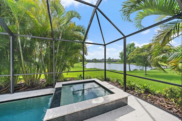 Great long lake views from the pool, spa and rear screened in lanai