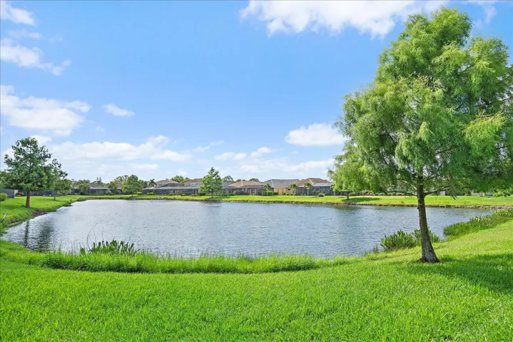 Great long lake views from the pool, spa and rear screened in lanai